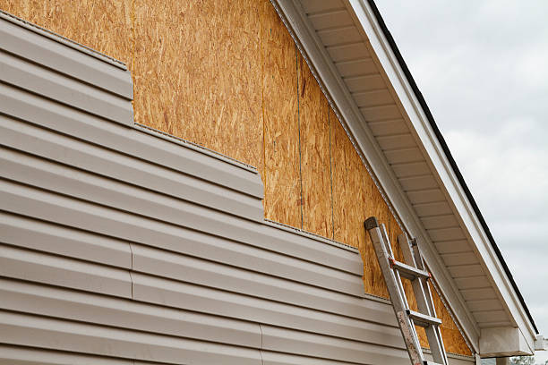 Professional Emergency Siding Repair technician working in Watertown, MA